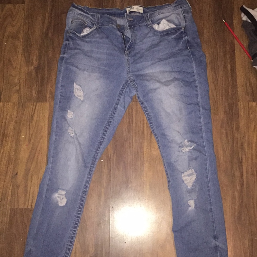 Ripped blue jeans
